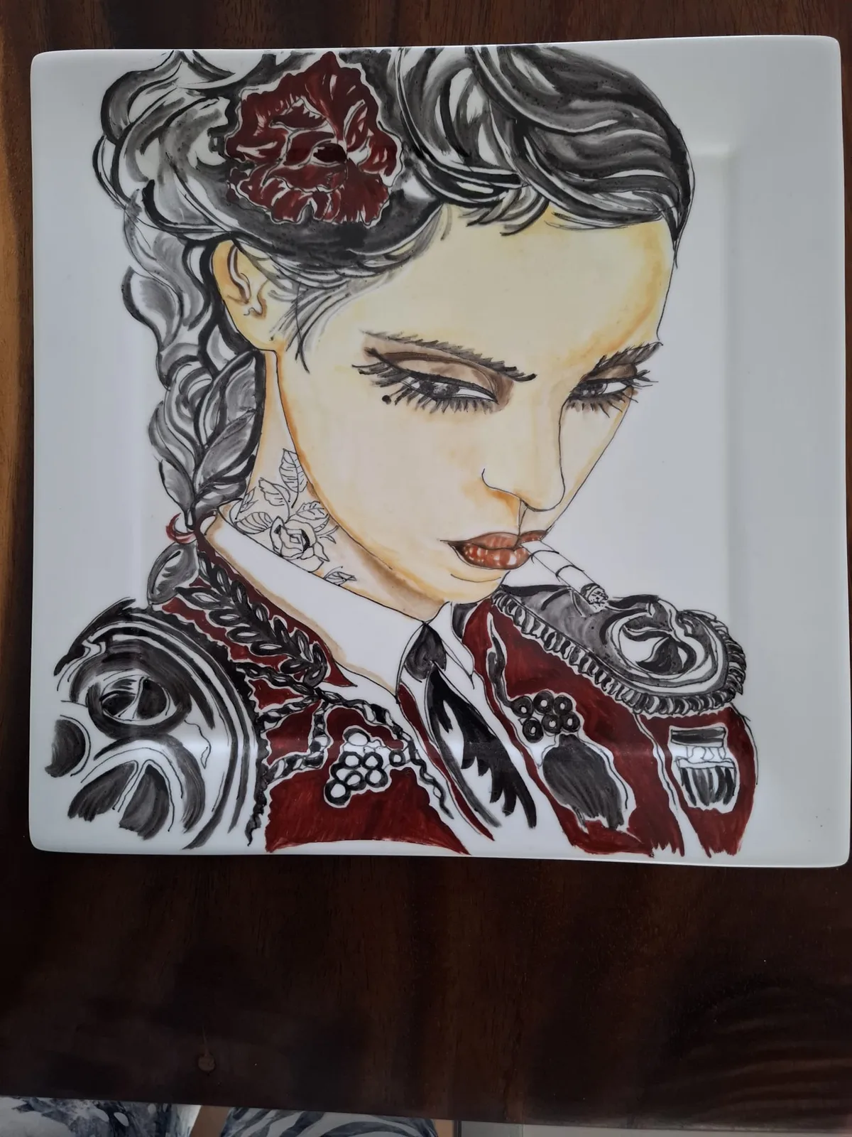 Handbeschilderd bord met Spaans portret